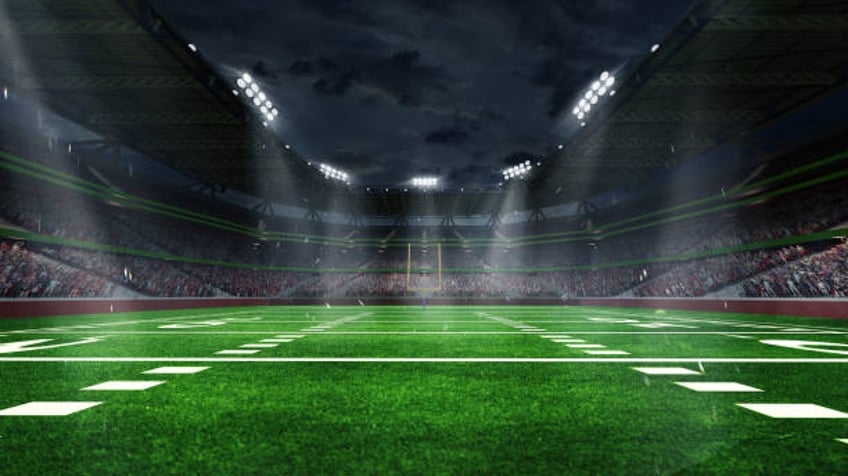 american football arena with yellow goal post, grass field and blurred fans at playground view. 3d render. flashlights - sports gambling stadium stock pictures, royalty-free photos & images