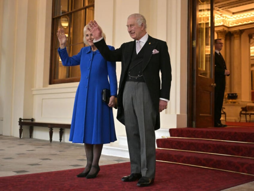 LONDON, ENGLAND - NOVEMBER 23: King Charles III and Queen Camilla wave during a formal farewell to South Korea's President Yoon Suk Yeol and South Korea's First Lady Kim Keon Hee, as they leave Buckingham Palace on the last day of the President of the Republic of Korea's state visit …