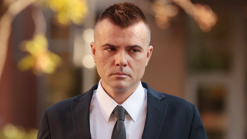 Russian analyst Igor Danchenko arrives at the Albert V. Bryan U.S. Courthouse before being arraigned on Nov. 10, 2021, in Alexandria, Virginia. Danchenko has been charged with five counts of making false statements to the FBI regarding the sources of the information he gave the British firm that created the so-called "Steele Dossier," which alleged potential ties between the 2016 Trump campaign and Russia.