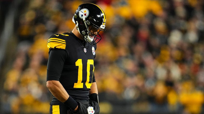 Mitch Trubisky looks on during an NFL game