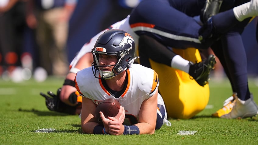 Bo Nix on ground