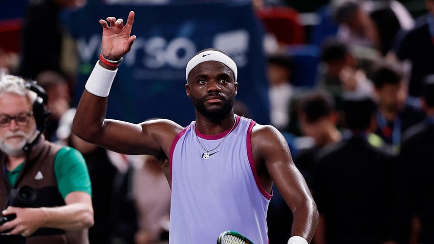 Frances Tiafoe celebrates