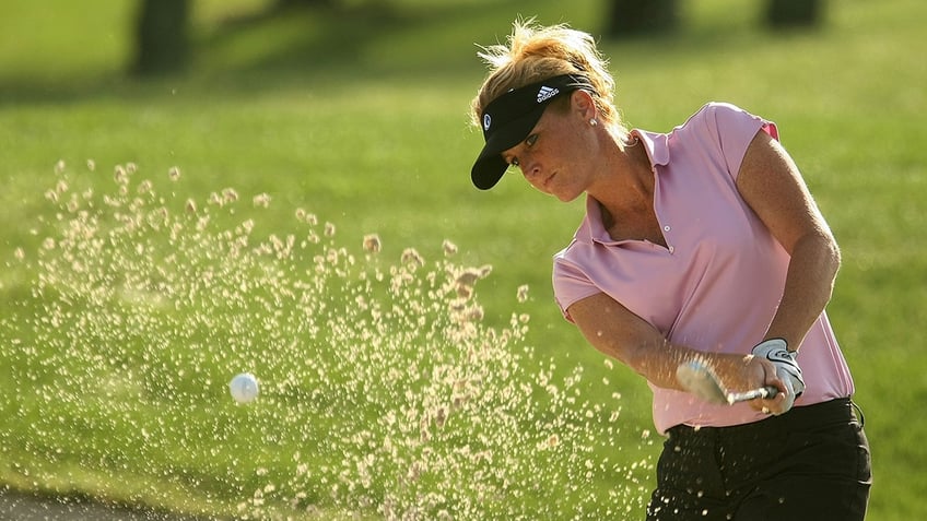 Stephanie Sparks hits a bunker shot