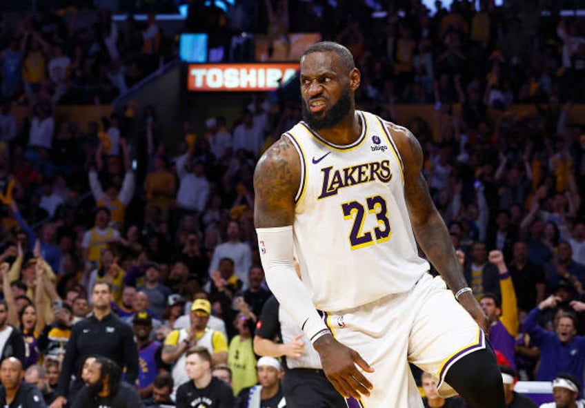 LeBron James of the Los Angeles Lakers after making a slam dunk against the Denver Nuggets in the second half during game four of the Western...