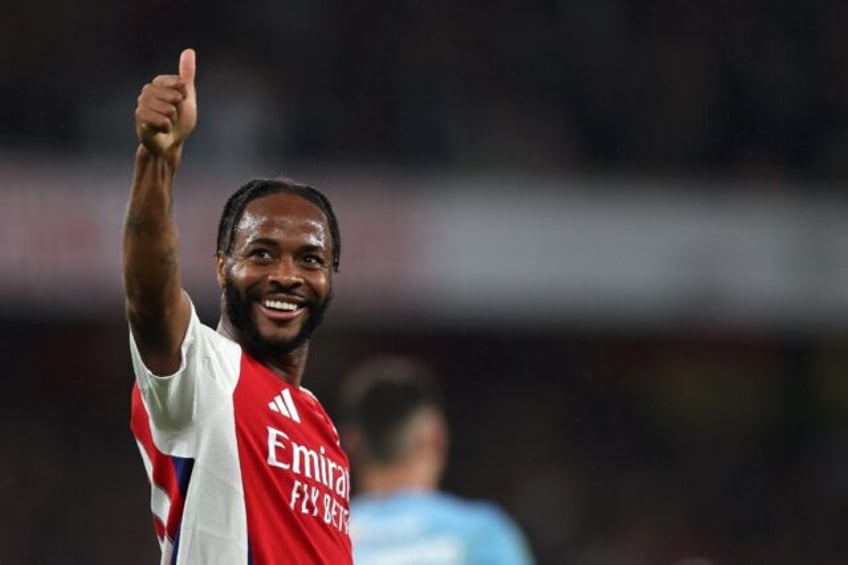 Arsenal's Raheem Sterling celebrates scoring against Bolton