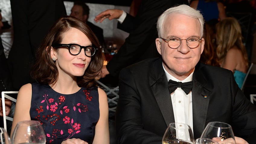 Anne Stringfield and Steve Martin sitting at a table together