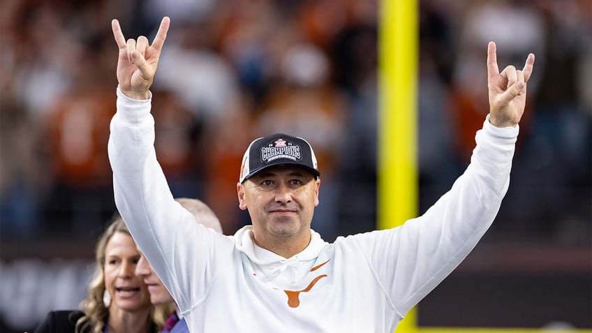 Steve Sarkisian celebrates the Big 12 Championship