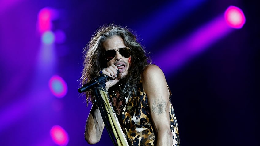 steven tyler postpones aerosmith shows frontman faces years of injury rehab and sexual assault accusations