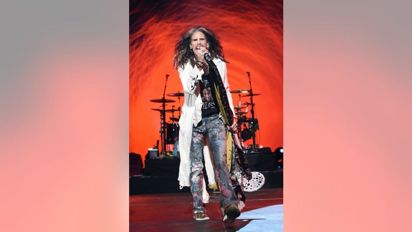 steven tyler postpones aerosmith shows frontman faces years of injury rehab and sexual assault accusations