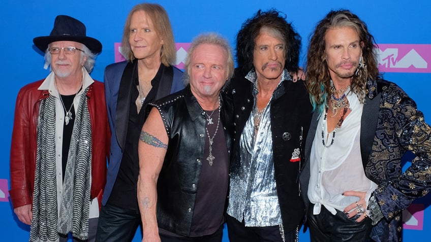 steven tyler postpones aerosmith shows frontman faces years of injury rehab and sexual assault accusations