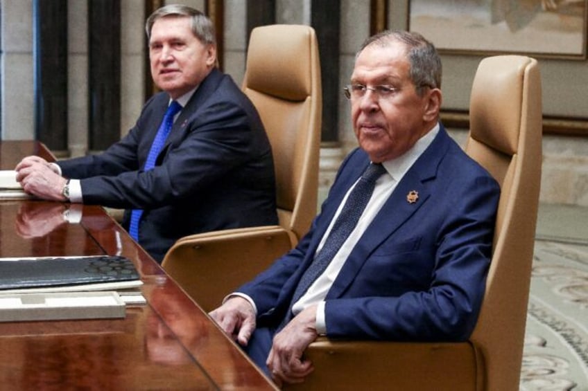 Russia's Foreign Minister Sergei Lavrov with presidential advisor Yuri Ushakov at the star