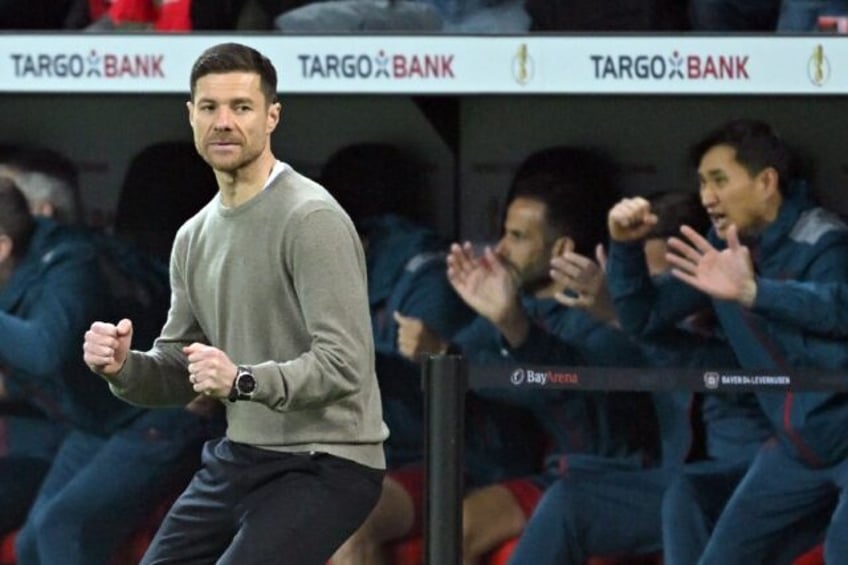 Bayer Leverkusen coach Xabi Alonso pumped the brakes on title talk, saying his league lead