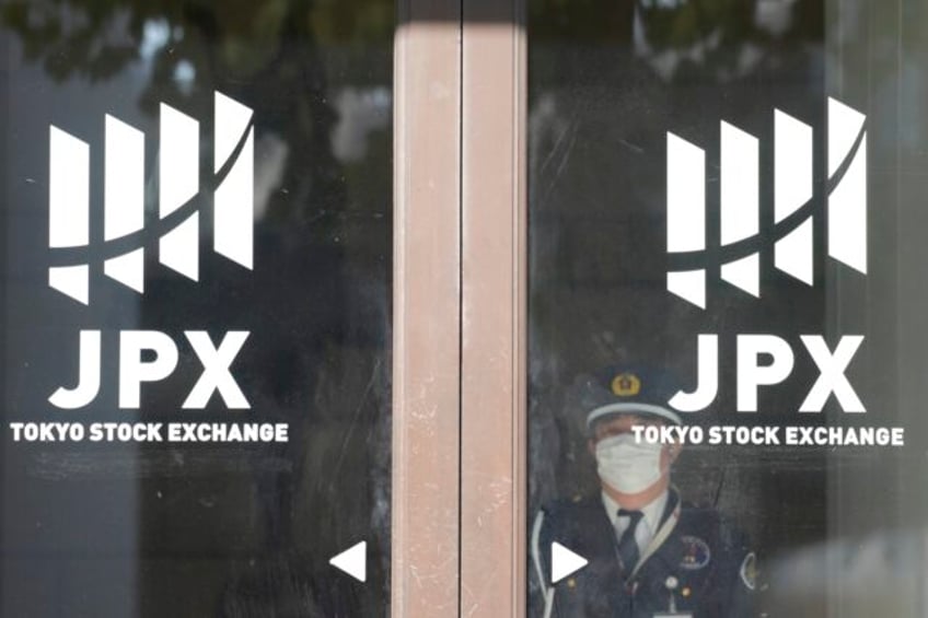stock market today asian shares are mostly lower with markets in japan and us closed
