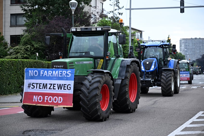 BRUSSELS, BELGIUM - JUNE 04: European farmers gather in front of the Atomium with tractors and block the street to protest against the European Union's (EU) environmental policies and cheap imports of agricultural products in Brussels, Belgium on June 04, 2024. (Photo by Dursun Aydemir/Anadolu via Getty Images)