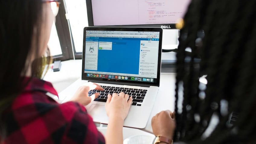 Women looking at computer