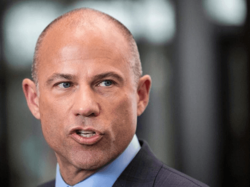 Attorney Michael Avenatti, who is representing an alleged R. Kelly victim, speaks to reporters at the Leighton Criminal Courthouse in Chicago after the R&B singer entered a not guilty plea to all 10 counts of aggravated criminal sexual abuse, Monday morning, Feb. 25, 2019. (Ashlee Rezin/Chicago Sun-Times via AP)