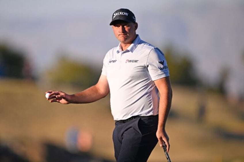 Austrian Sepp Straka reacts to a putt on the way to victory in the US PGA Tour American Ex