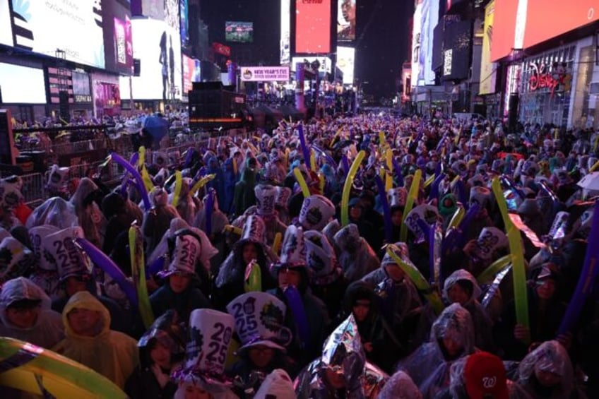 Revelers celebrating New Year's Eve in Times Square