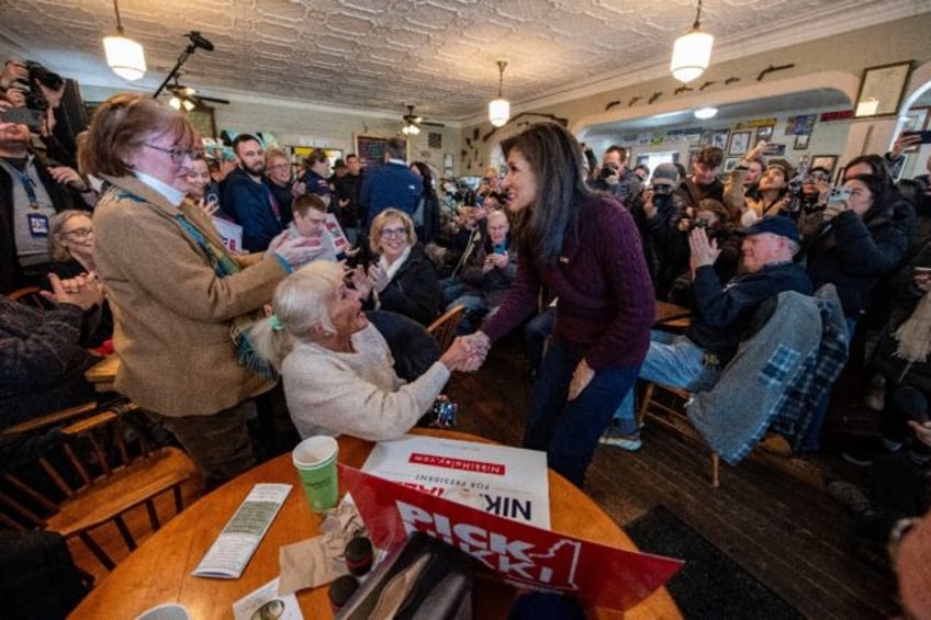 Nikki Haley addresses potential voters at a grocery store in New Hampshire ahead of the primary