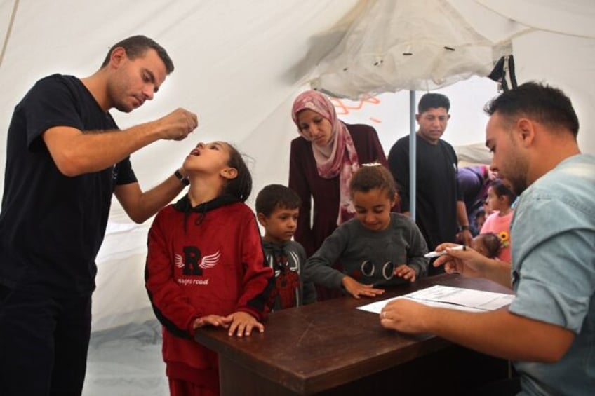 A polio vaccine drive restarted in northern Gaza on Saturday but a strike hit one health c