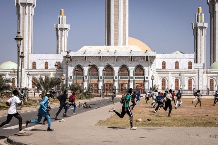 Protesters on the move in Dakar on Friday