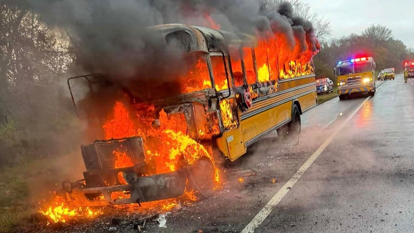 school bus engulfed in flames
