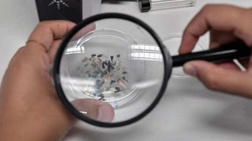 magnifying glass microplastics
