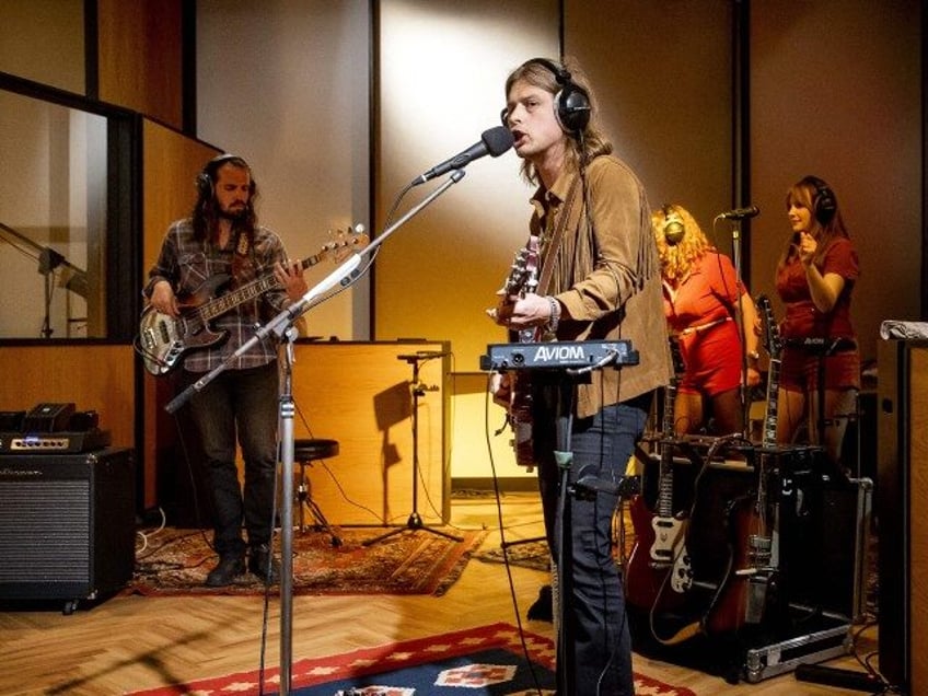 Members of rock band DeWolff work in the studio in Haarlem on June 1, 2023. The music grou