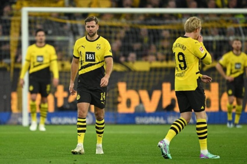 stung dortmund hope to rebound in crunch newcastle clash