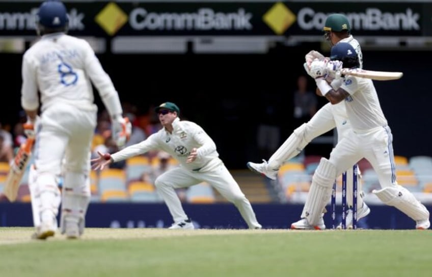 Steve Smith dives to his right to take a stunning catch and dismiss KL Rahul