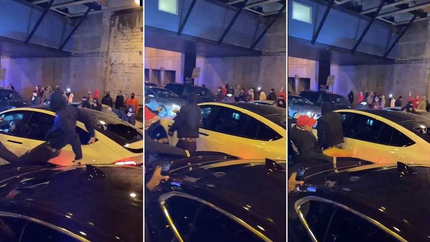 stunning video shows chicago mob attack tesla amid lawless street takeover