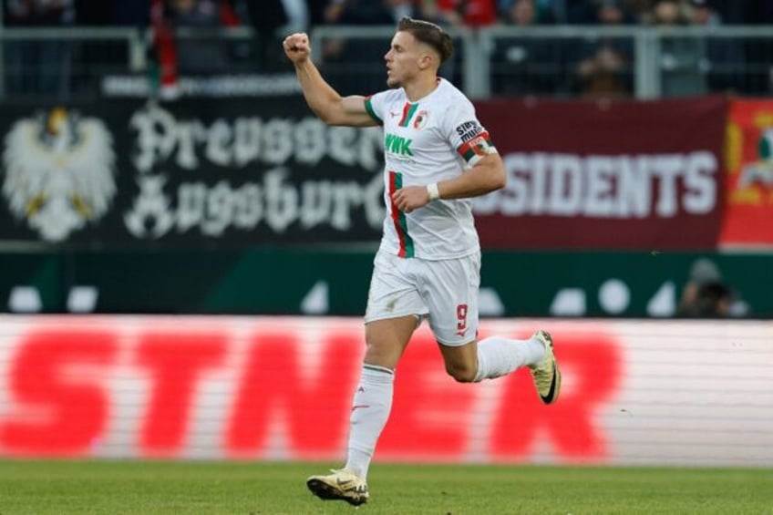 Ermedin Demirovic celebrates scoring for Augsburg against Bayern Munich in January