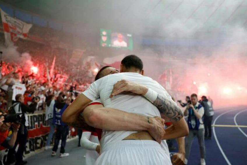 Lift off in Stuttgart as French midfielder Enzo Millot (front) celebrates scoring his team