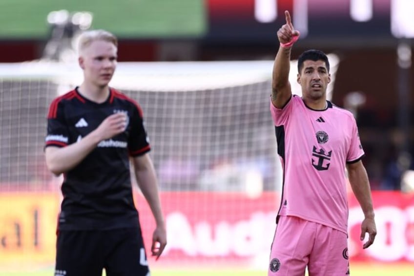 Luis Suarez, right, came off the bench to score twice for Inter Miami in a 3-1 win at D.C.