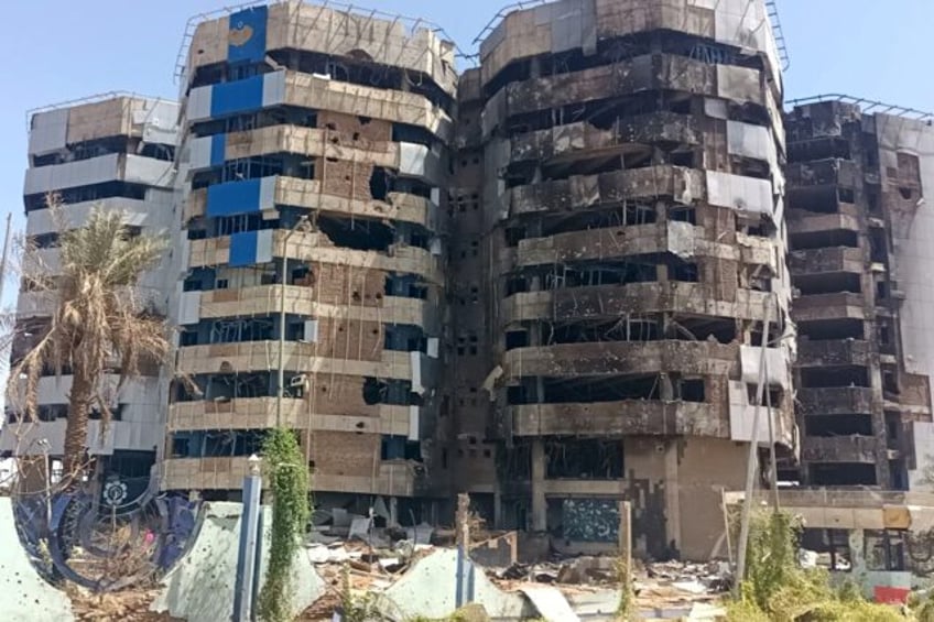 The heavily-damaged Central Bank of Sudan building near the Blue Nile River in Khartoum, a