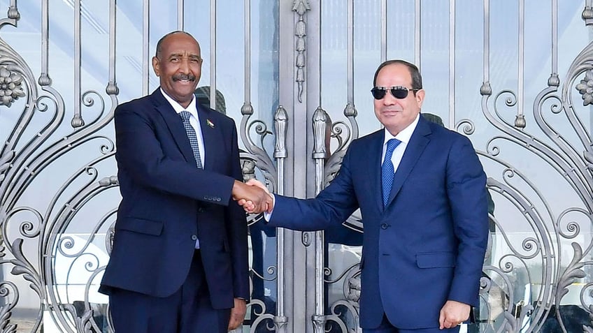 sudanese military leader visits egypt on 1st trip abroad since war breaks out in sudan