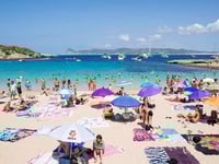 Summer beach battle between locals and visitors heats up as overtourism soars