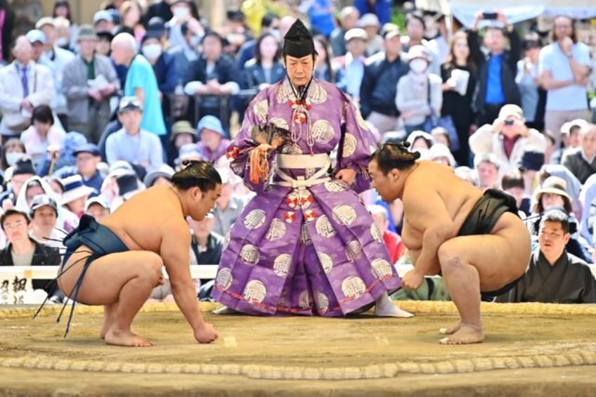 File photo of sumo wrestlers at a ceremonial exhibition in Tokyo