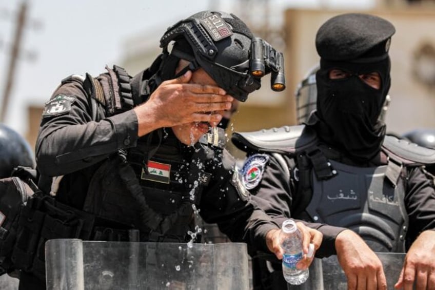 sun baked iraqis protest water and electricity shortages