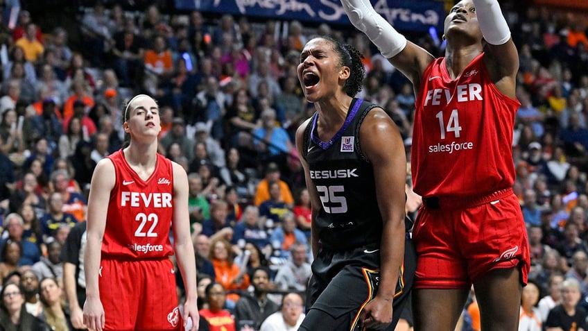 Alyssa Thomas celebrates