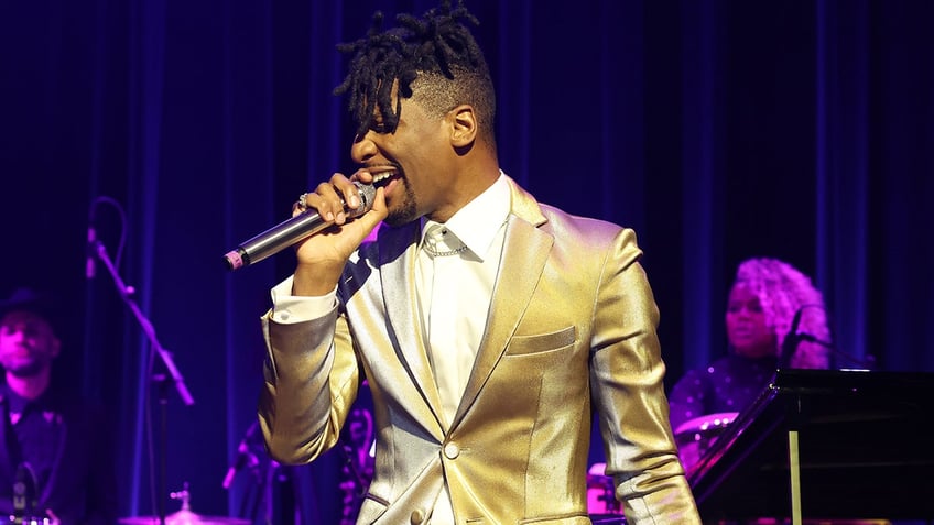 Jon Batiste singing at Grand Opening Of Jon Batiste's Jazz Club At Baha Mar