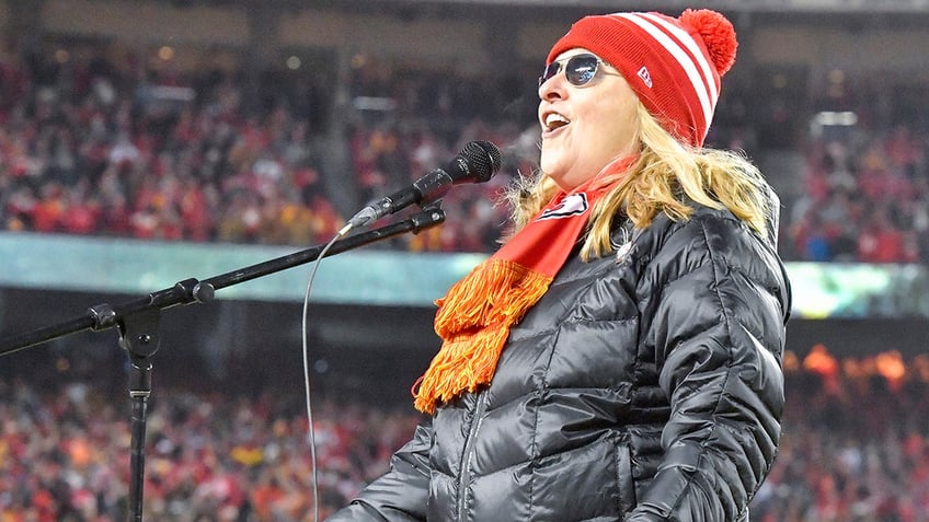 Melissa Etheridge singing the national anthem at the New England Patriots vs. Kansas City Chiefs game in 2019.