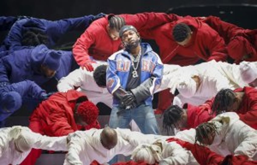 Super Bowl dancer banned by NFL; won't face charges for flag protest