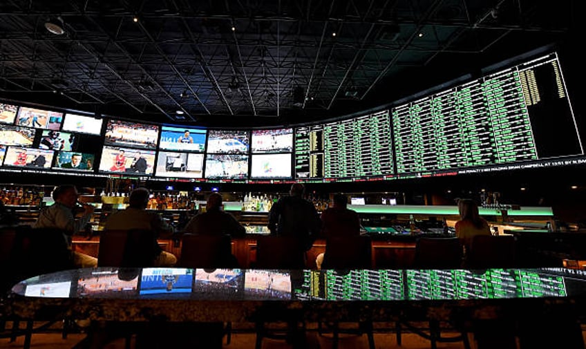 The betting line and some of the nearly 400 proposition bets for Super Bowl 50 between the Carolina Panthers and the Denver Broncos are displayed at...