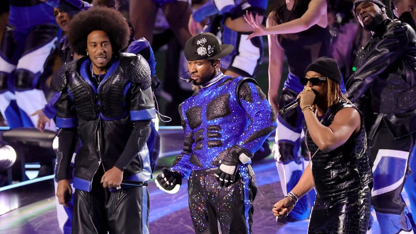 A photo of Ludacris, Usher and Lil Jon at halftime show