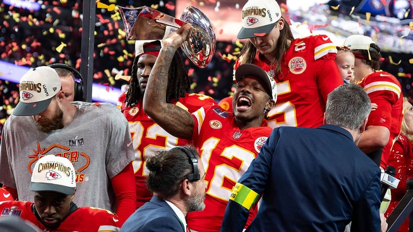 Mecole Hardman with Lombardi Trophy