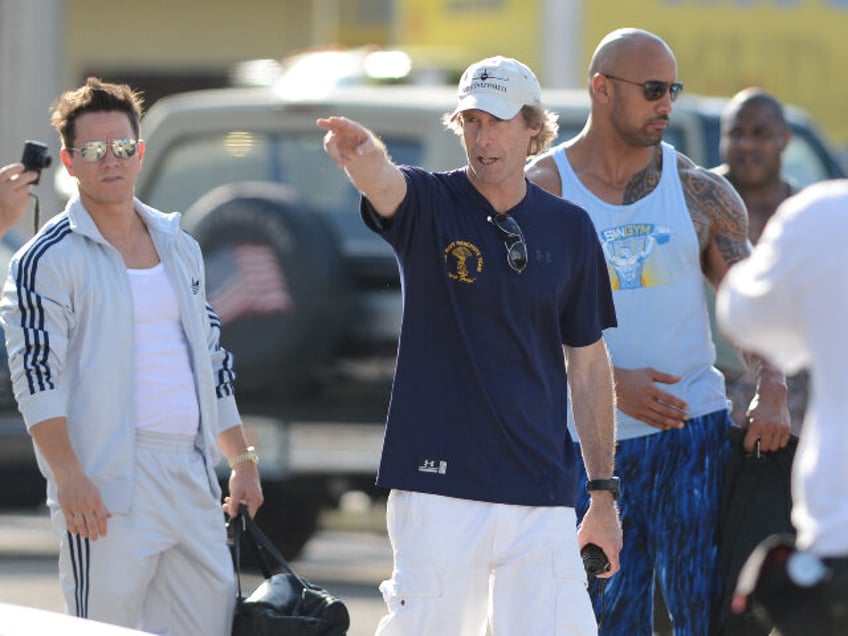 MIAMI, FL - APRIL 04: Mark Wahlberg, Michael Bay and Dwayne "The Rock" Johnson a