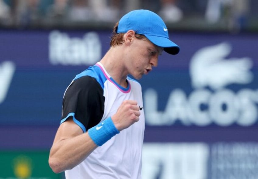 Jannik Sinner of Italy celebrates his win over Daniil Medvedev in the semi-final of the Mi