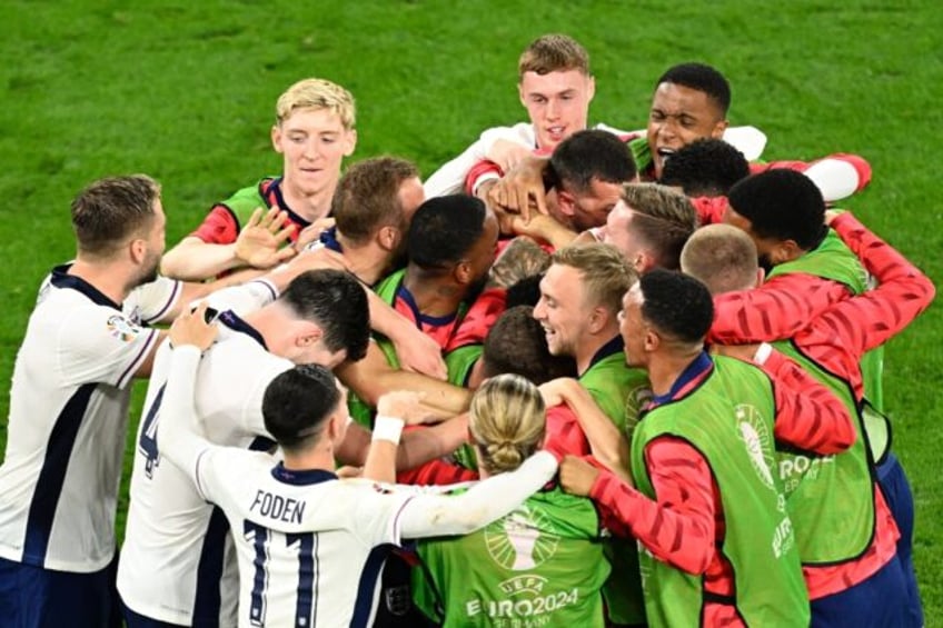 England players celebrate Ollie Watkins' winner against Netherlands in the Euro 2024 semi-