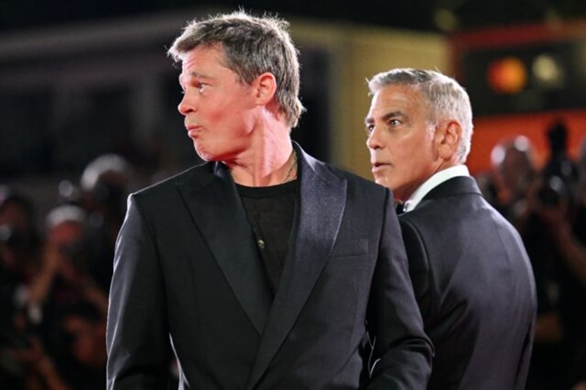 Clooney (R) said it felt second nature sparring with Pitt (L) in the action comedy